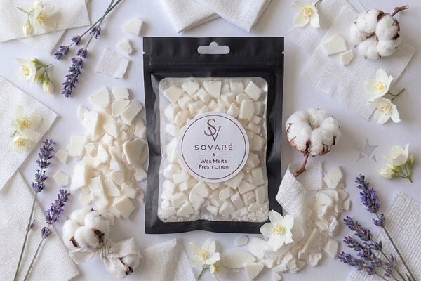Fresh Linen Wax Melts by Sovaré in a black resealable bag with white wax chunks.