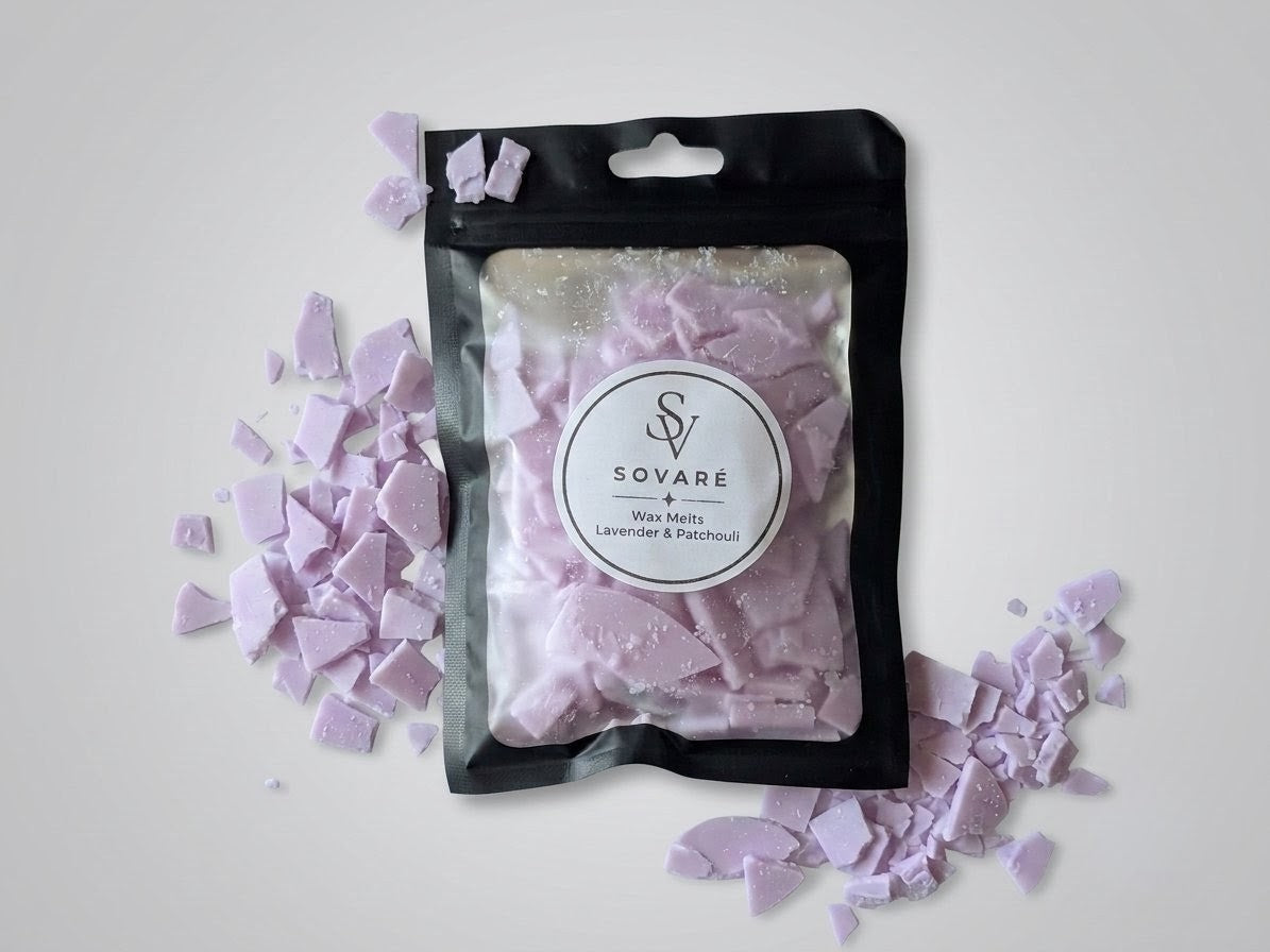 Wax Melt Flakes in purple, white, blue, burgundy, yellow, and orange in Sovare resealable bags.