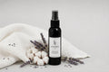 Sovaré Fresh Linen Room Spray bottle, black glass with spray cap, lavender and cotton accents.