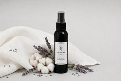 Sovaré Fresh Linen Room Spray bottle, black glass with spray cap, lavender and cotton accents.