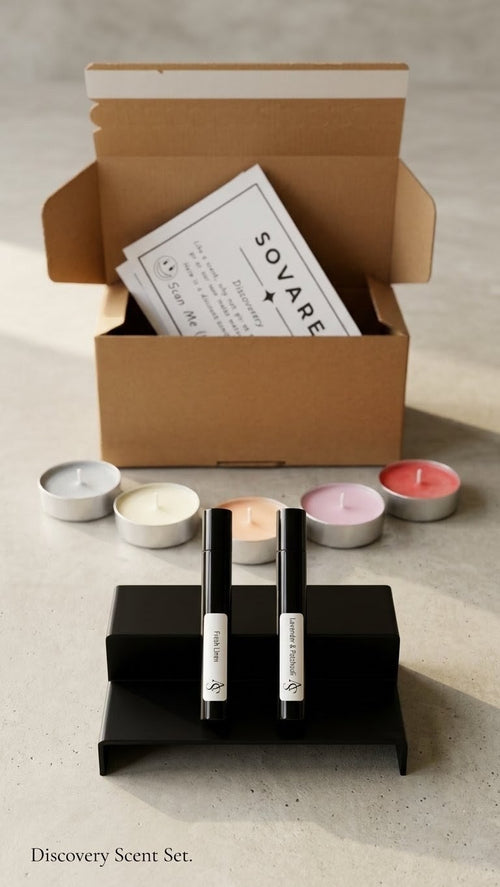 Discovery Box Set by Sovaré; cosmetic set with six colored tealight candles and two black-labeled pens